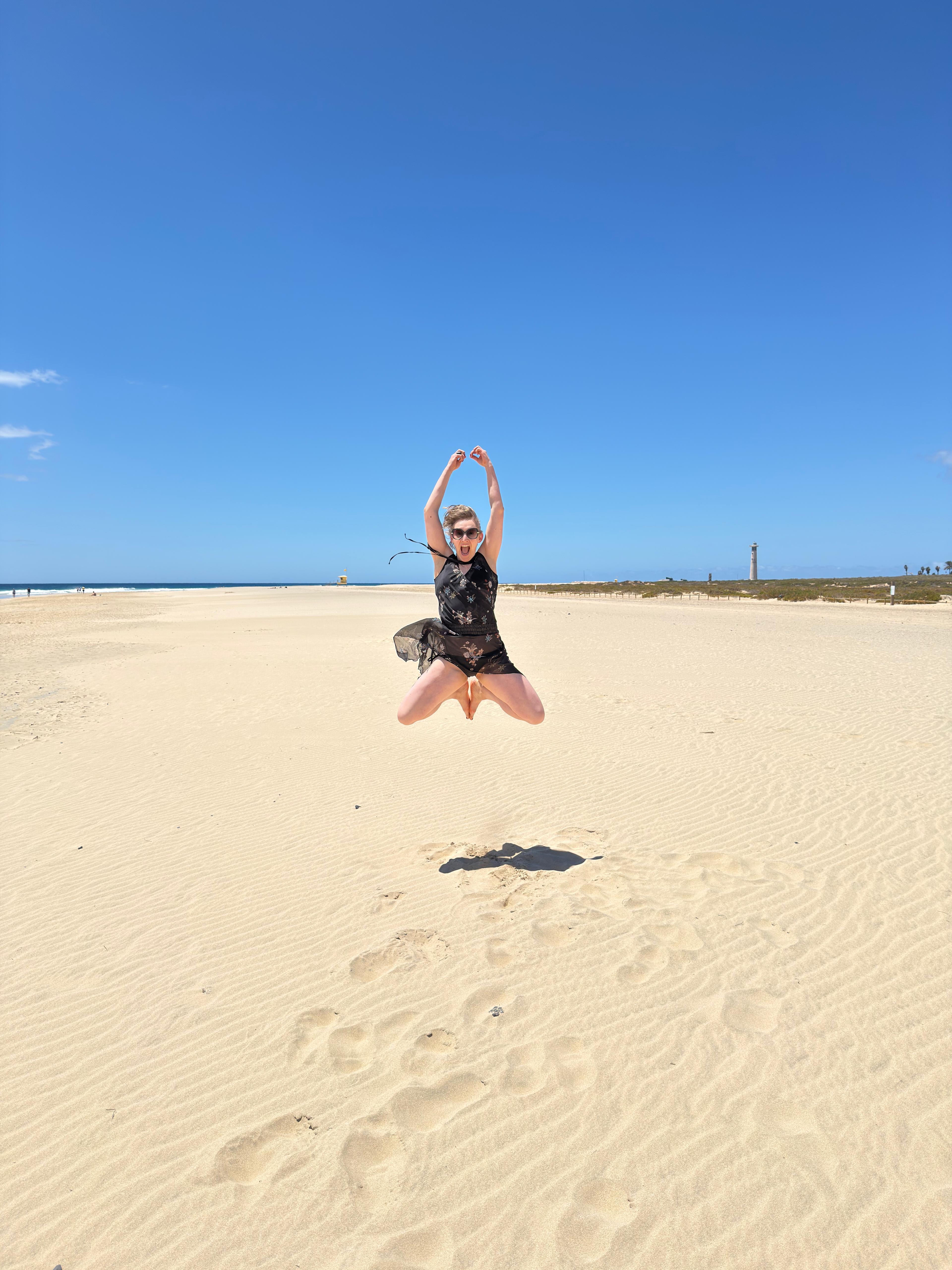 Yoga jump on the dunes